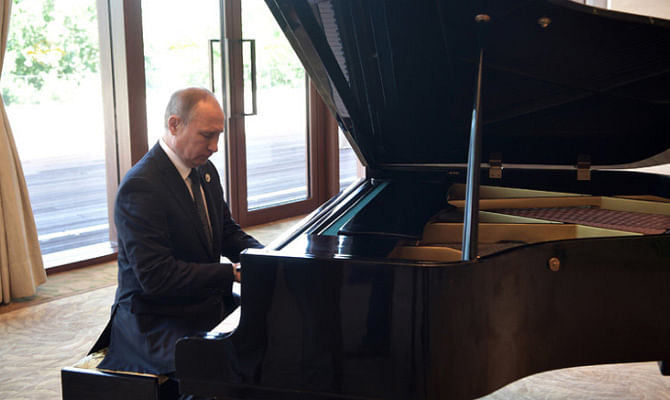 Vladimir Putin Plays Two Piano Tunes From His Childhood In Beijing