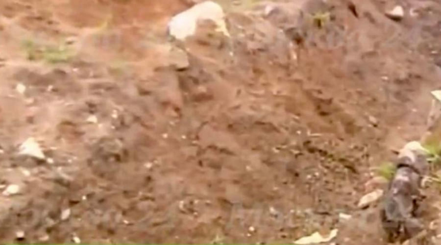 man BURIED ALIVE by Moscow gangsters uses his mobile to call for help from grave
