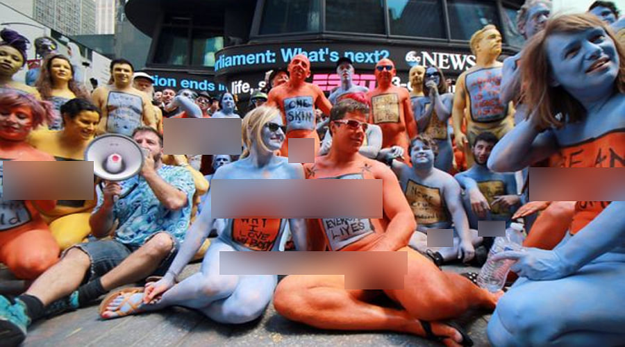 Hundreds of models pose NUDE in Times Square 'to promote positivity and acceptance'