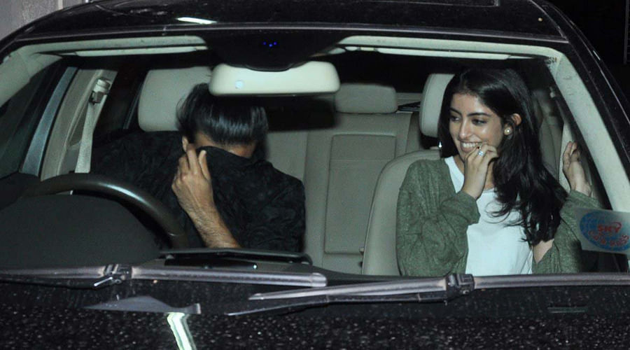 Is he Big B's grand daughter Navya's boyfriend who just hide his face seeing Cameras?