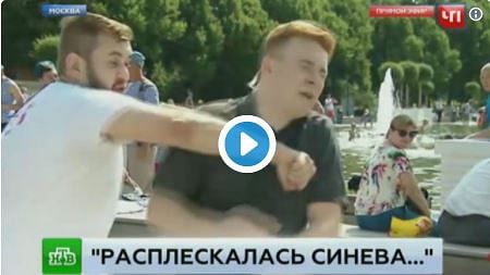 Russian news reporter punched during live tv programme 