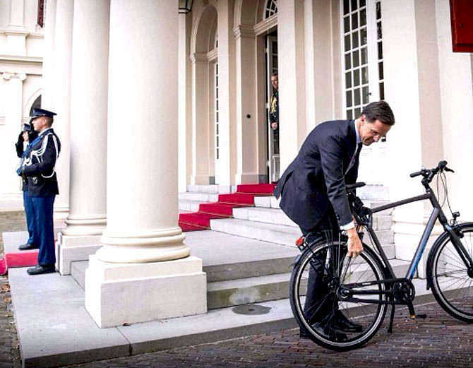 Prime minister of netherlands Mark Root reached king villa by bicycle   
