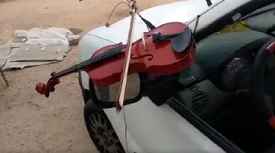Can a car play violin, Yes, Watch Video