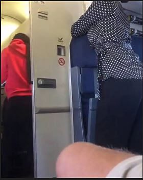 viral video of couple emerge airplane bathroom