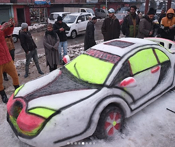 kashmiri boy makes car from snow