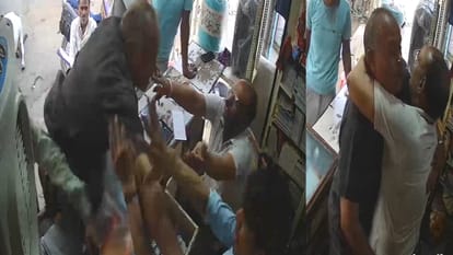 Bullying by MP Police SI and his son, water bottle thrown on shopkeeper, assault after entering the shop