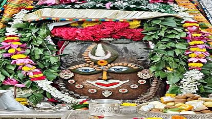 Mahakal Mandir Ujjain Baba Mahakal decorated with garland of Bel leaves and lotus flowers