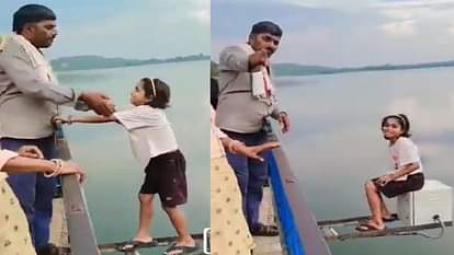 Bharatpur News: रील के चक्कर में दांव पर लगाई मासूम की जिंदगी, पिता ने बेटी को बरेठा बांध की रैलिंग पर उतारा Bharatpur News: Father Puts Daughter’s Life at Risk for Reel, Makes Her Stand on Baretha Dam Railing
