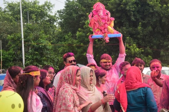 'Durvabhishek' (ritual bathing with sacred Durva grass) of the 'King of Vows' performed using 108 names.