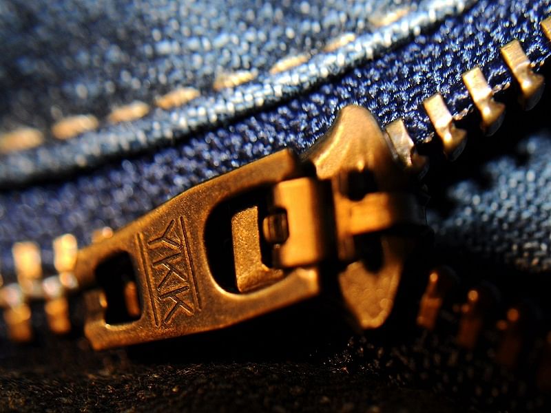 Why 'YKK' is written on every zipper?