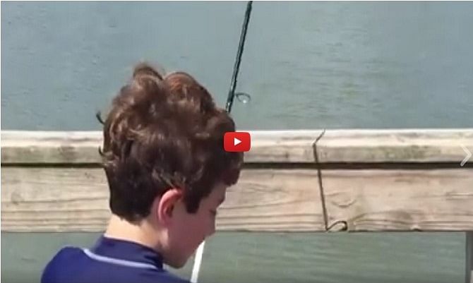 This boy was trying to catch a fish and then something weird happened 