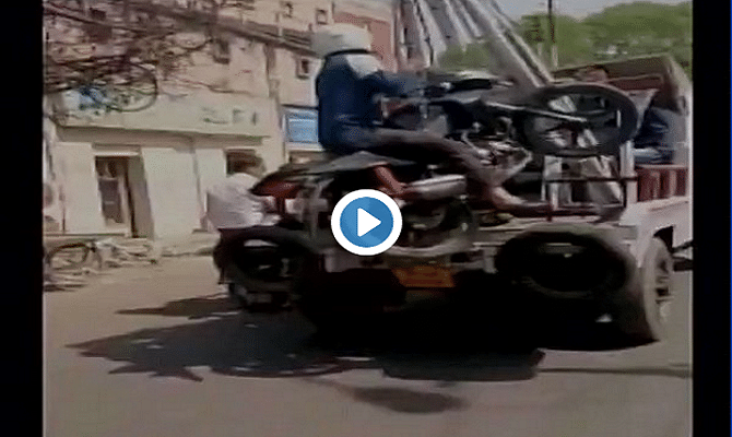 Man towed along with his motorcycle in Kanpur