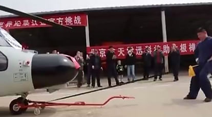 Kung Fu master uses his sex organ to pull enormous HELICOPTER in latest bizarre world record