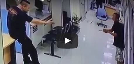 man enters in police station with knife policemen handle the man with care in bangkok