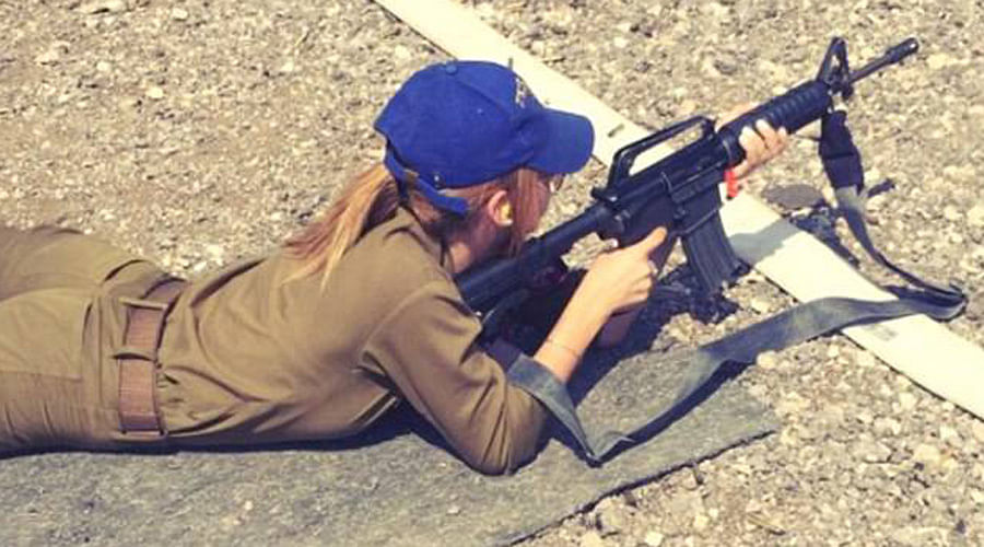 Glamorous Israeli soldier Kim Mellibovsky is winning legions of fans with her pictures 
