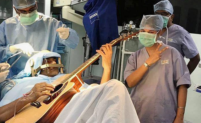 Musical Operation: Patience Playing Guitar while Neurological Disorder Surgery 