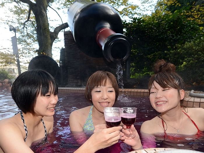 spa resort offers red wine, tea, coffee to bath in japan