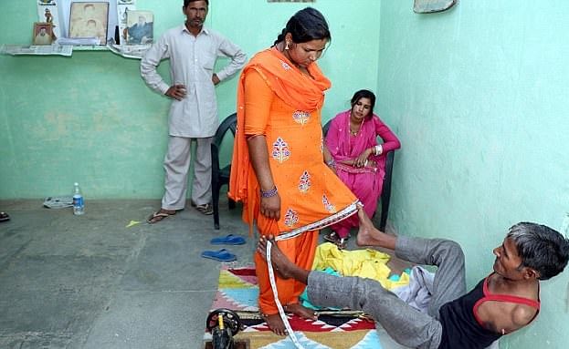 armless indian tailor madan lal is creating internet sensation by his works