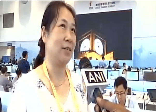 chinese reporter singing hindi song going viral on internet