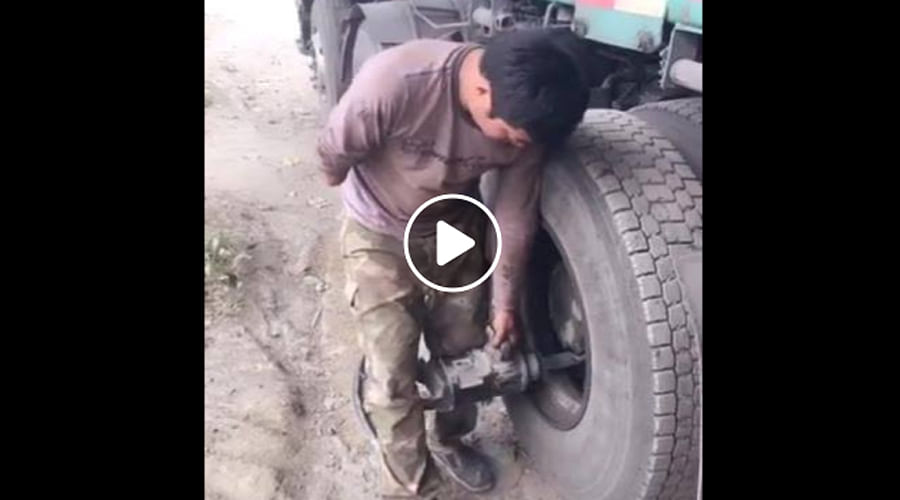 Specially Abled man repairs truck tyre, you can take inspiration