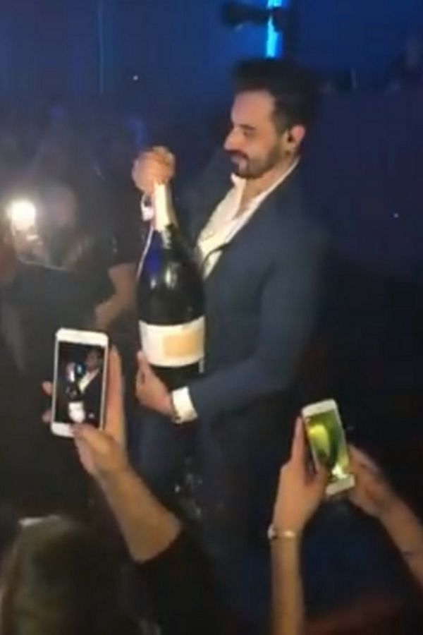 OMG Guy Breaks Champagne Bottle Worth Rupee 27 Lakh