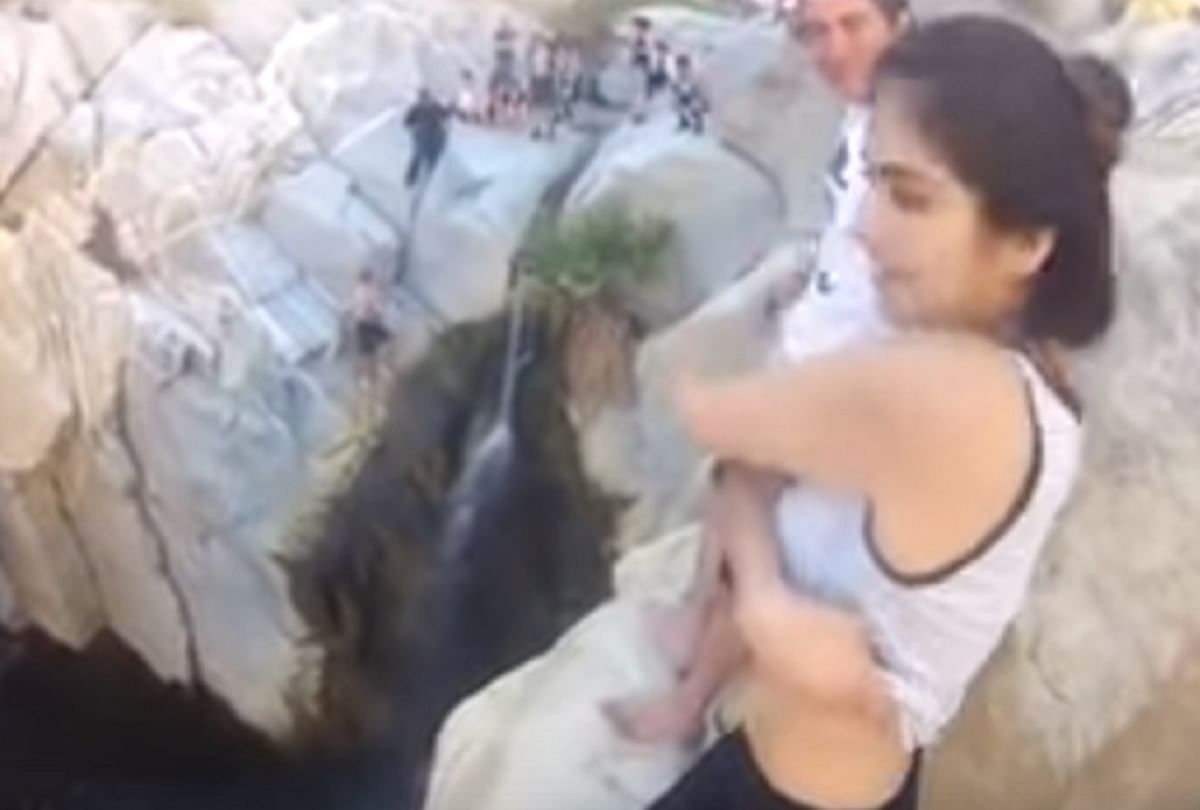 Girl jumped into water from top of the hill video Viral