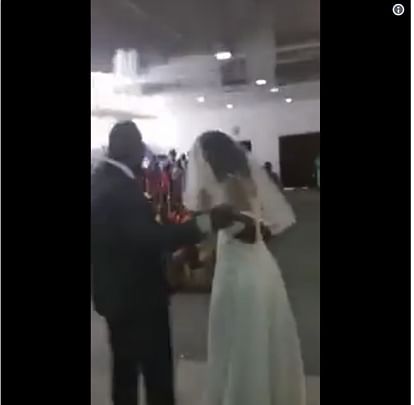 groom girlfriend appear in his wedding wearing a bridal dress created scene