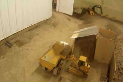 man has been digging his basement with remote controlled miniature machinery for last 14 years