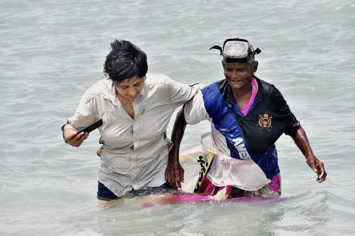 tamilnadu female scuba diver dive deep in sea to collect seaweeds