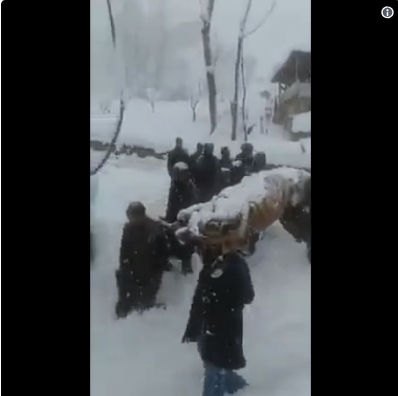 viral video people carry pregnant woman to hospital on stretch in heavy snowfall in kashmir