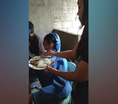 mother hand feeds video game addicted son in Philippines he played game for 48 hours video viral