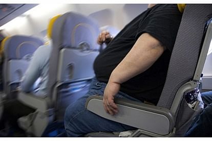 obese man pays half ticket price to co passenger for covering half seat