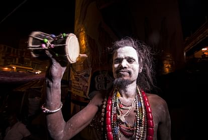 Varanasi manikarnika cremation ghat people play holi with pyre ashes