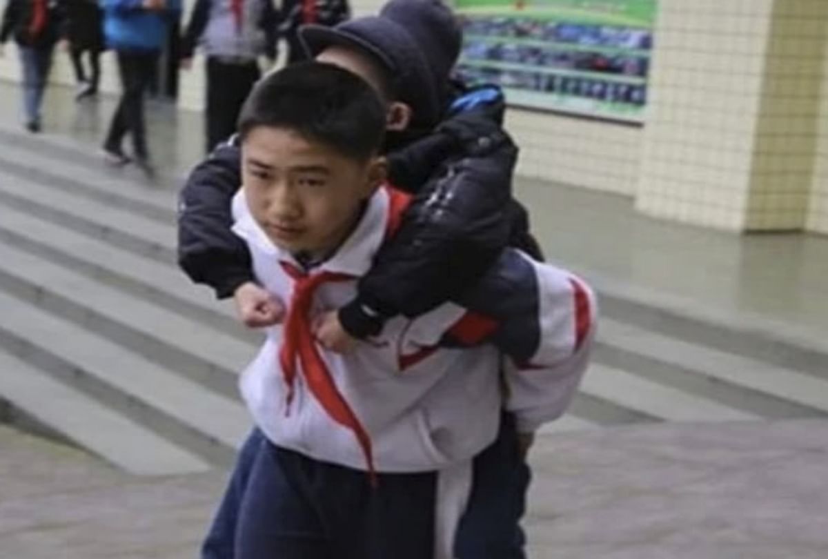 china friend carrying his disabled friend