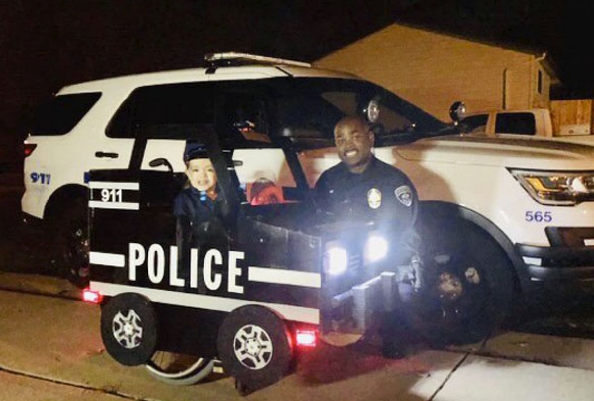 american father turn wheelchair into police car for his daughter happiness