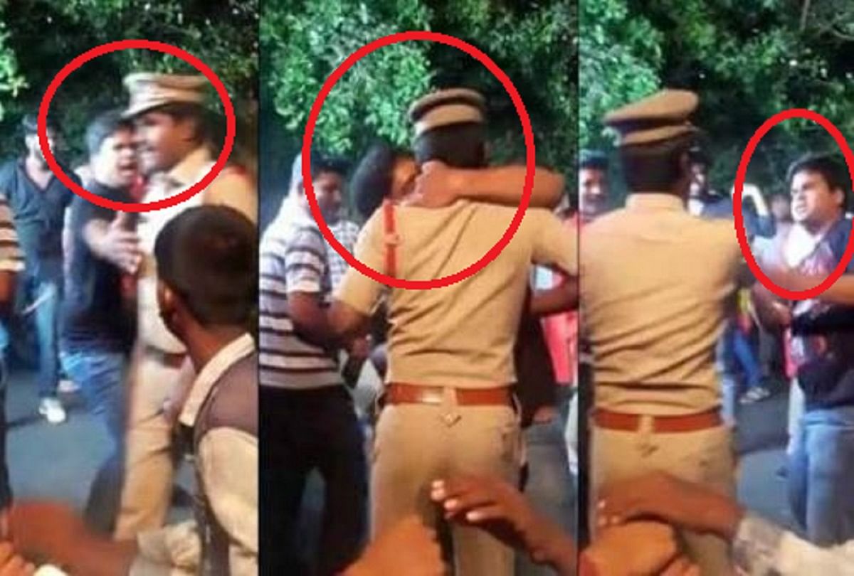 viral video of drunk man who kissed and hugged a police officer during bonalu festival