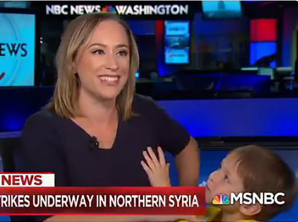 viral video of an tv anchor interrupt by son