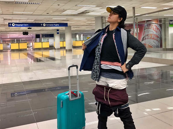 Philippin woman passengers wear 2 5kg clothes to avoid paying fee for excess baggage at airport