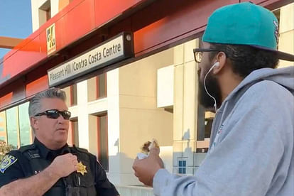 man eating sandwich police come arrest