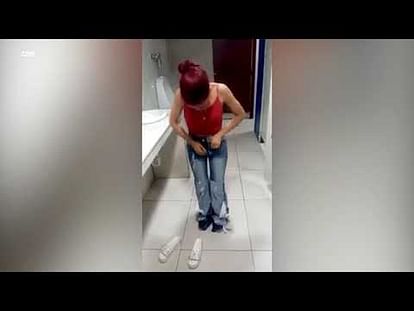 viral video of woman caught steal eight pairs