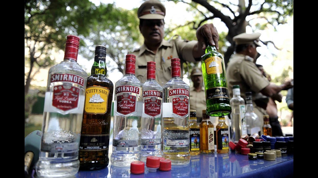 haryana police caught a person who trying to smuggle liquor bottles in ambulance
