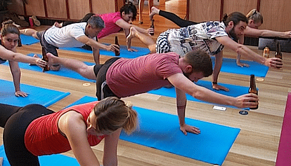 globally trending crazy fitness beer yoga