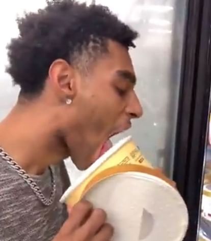 Man licking ice cream