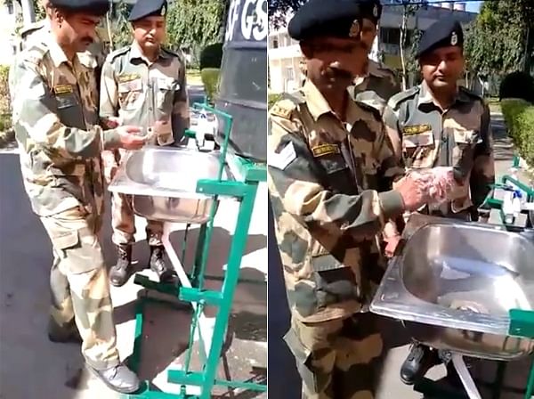 viral video of army soldiers made hands free sanitizing machine