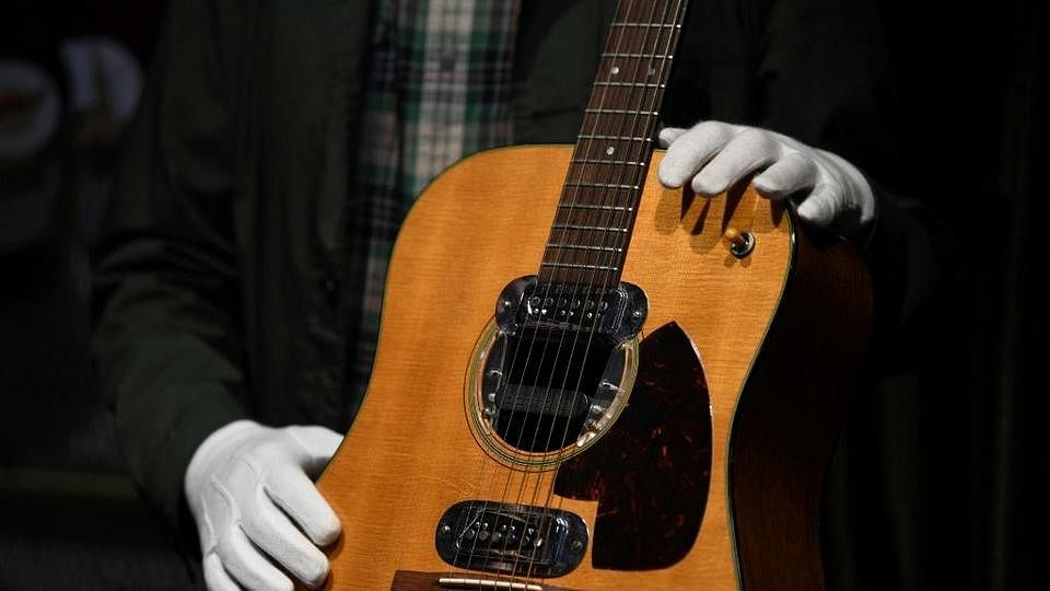 know the price of kurt cobain guitar price will shock you