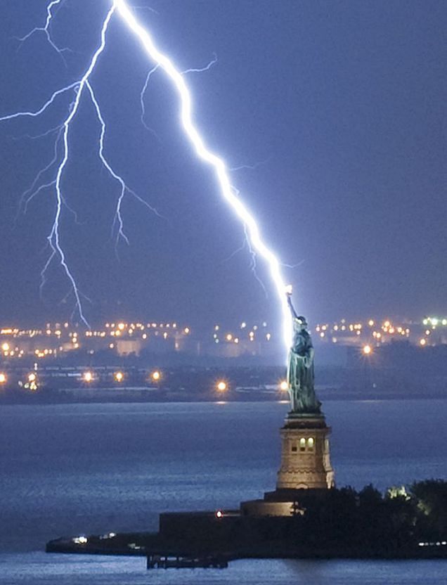 viral video of incredible insane footage of the Statue of Liberty is struck by lightning