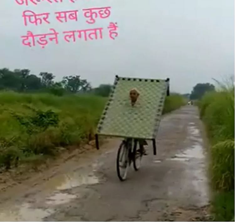 viral video of man who brings khatiya on his head while cycling people did hilarious comment on it