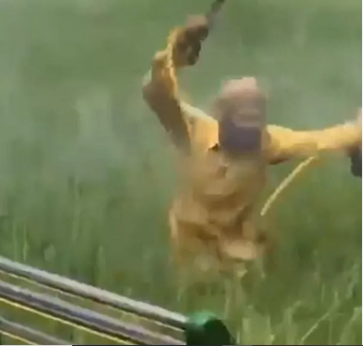 viral video of farmer who joyfully dance with during watering crops