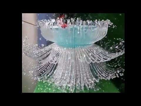 viral video of filled balloon bursting in slow motion and make beautiful fountain