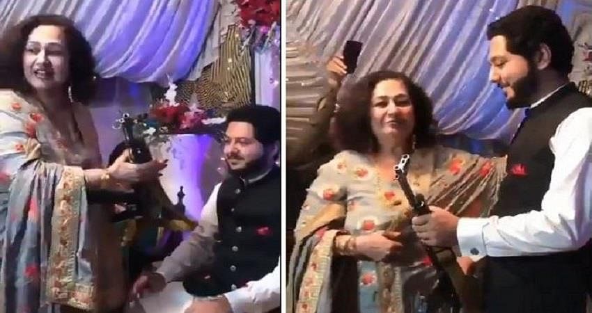 viral video of pakistani man get ak 47 rifile in his marriage through mother in law